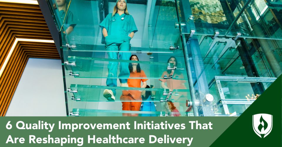 QI initiative header A modern, glass hospital stairway reveals different professionals in healthcare